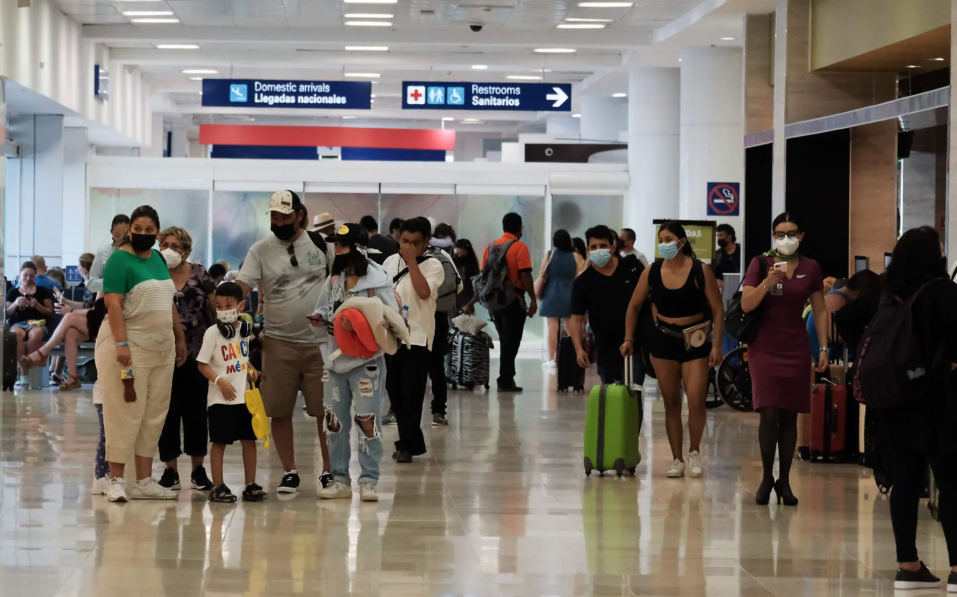 891090_Afluencia aeropuerto Cancún_impreso